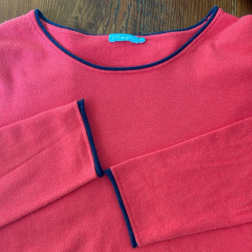 J.McLaughlin Medium dark pink sweater with navy blue piping on sleeves and neck.